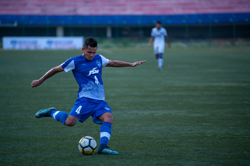 Shot of Nishu Kumar in action. He is seen putting in a cross for what proved to be a 'pre-assist' for BFC B's 5th goal of the evening.