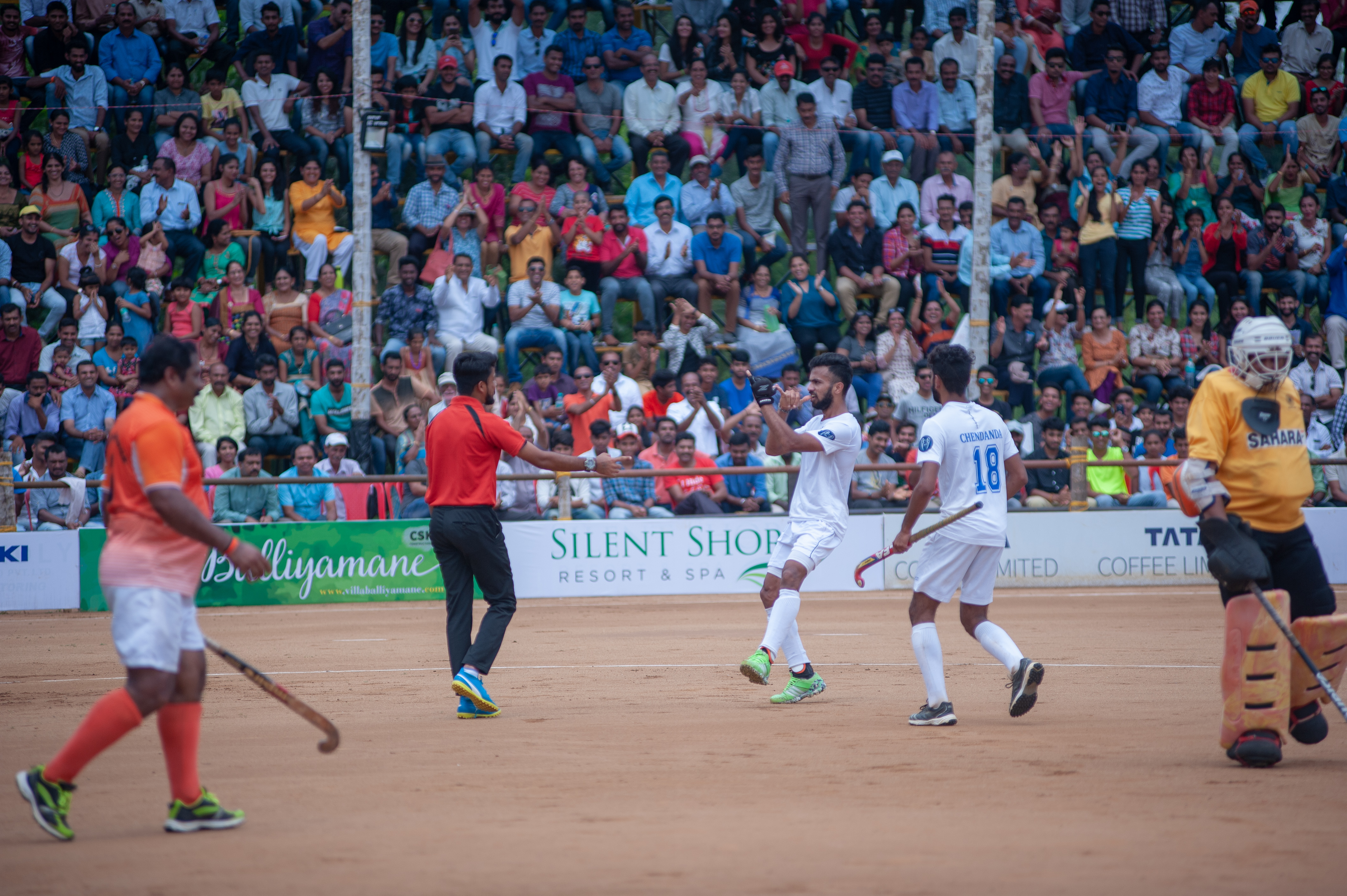 Nikkin Thimmaiah, a former India hockey player, breaks out into a dance in front of the fans after assisting Chendanda's second goal.