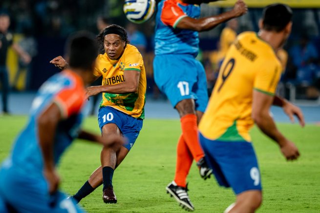 Ronalidinho in Chennai for the Brazil Legends team taking a free kick against the India All Stars